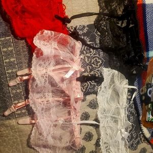 Lace garders with built in g-string  size small have 4 with the matching hose